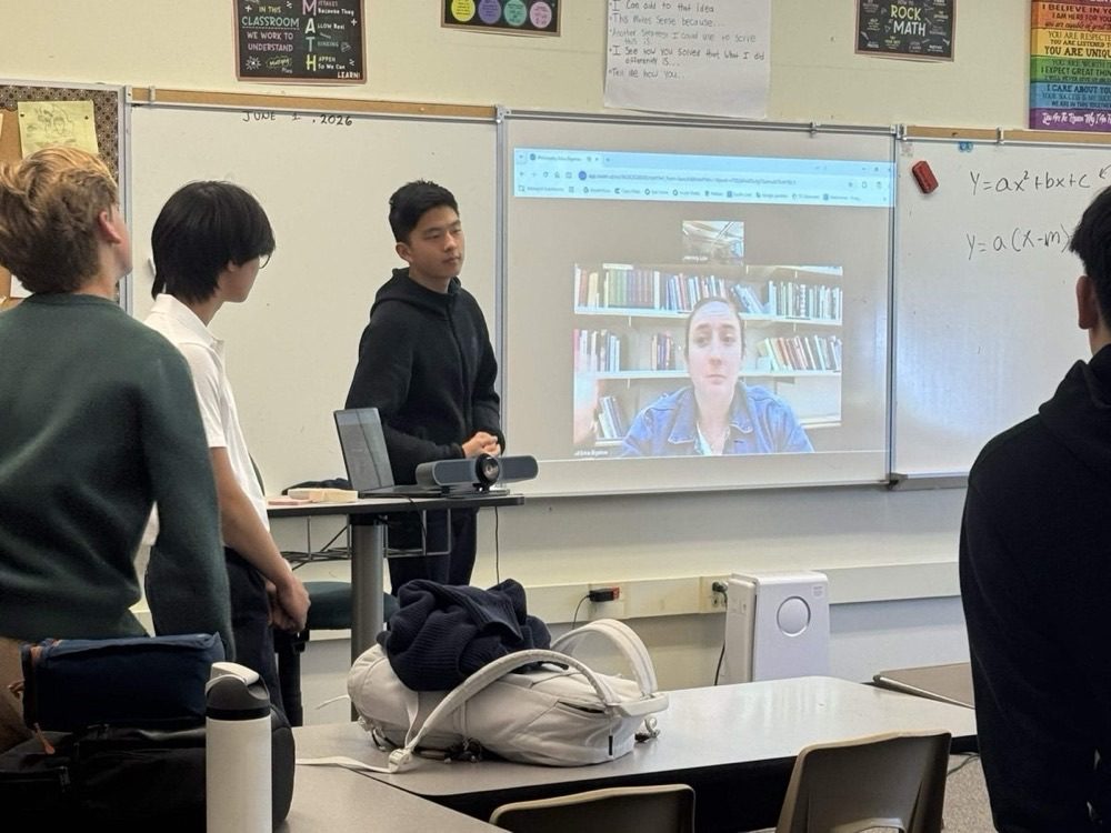 Students watching Erica Bigelow on the projector